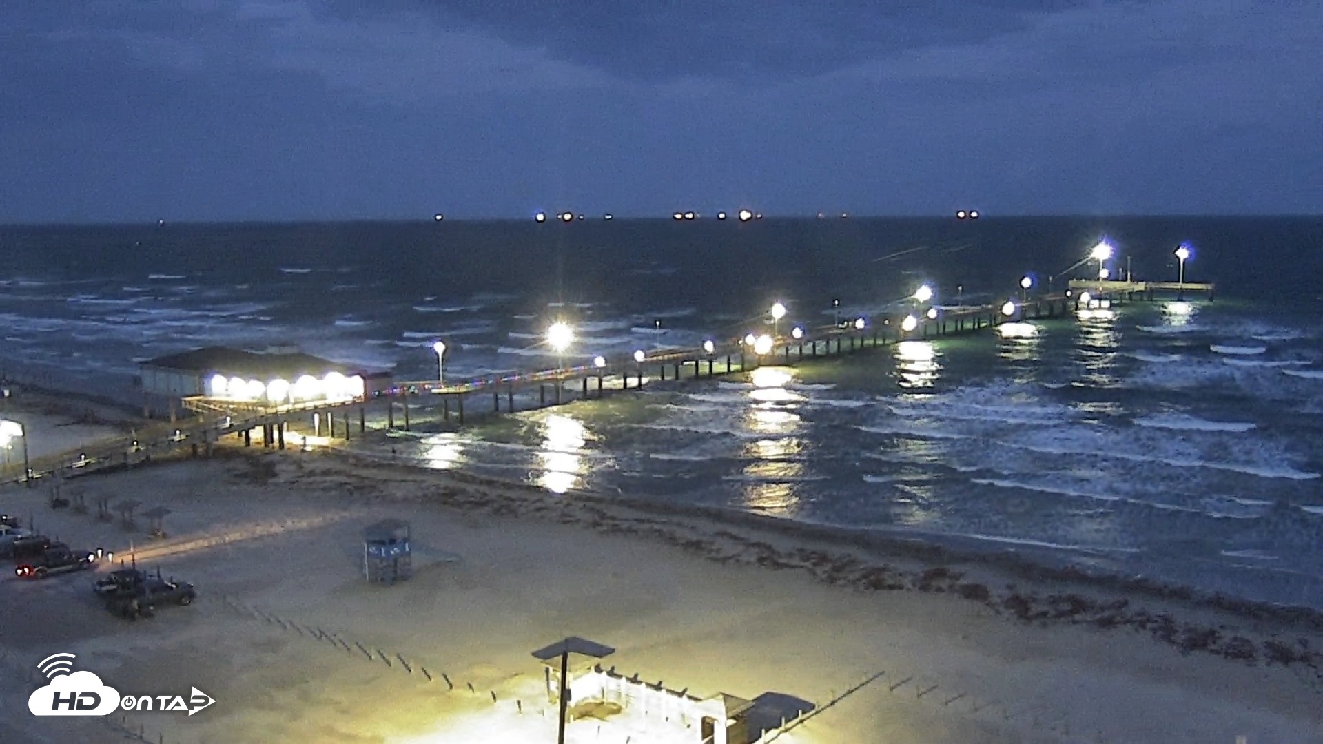 Snapshot of The Dunes - Port Aransas Live Beach Cam taken May 4, 2025, 8:29pm CDT