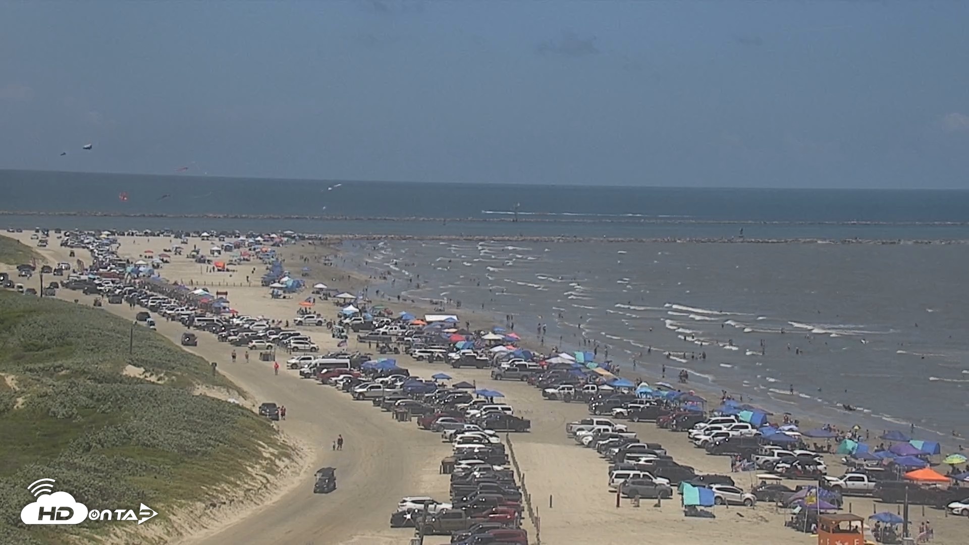 Snapshot of The Dunes - Port Aransas Live Beach Cam taken Jul 4, 2026, 2:34pm CDT