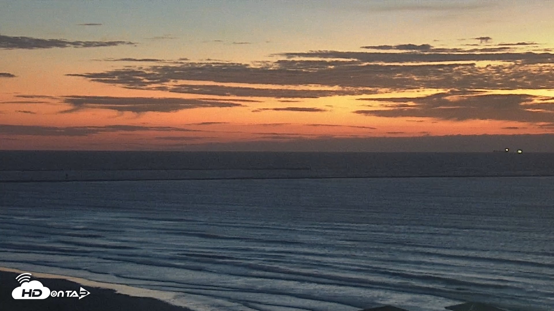 Snapshot of The Dunes - Port Aransas Live Beach Cam taken Oct 18, 2026, 7:02am CDT
