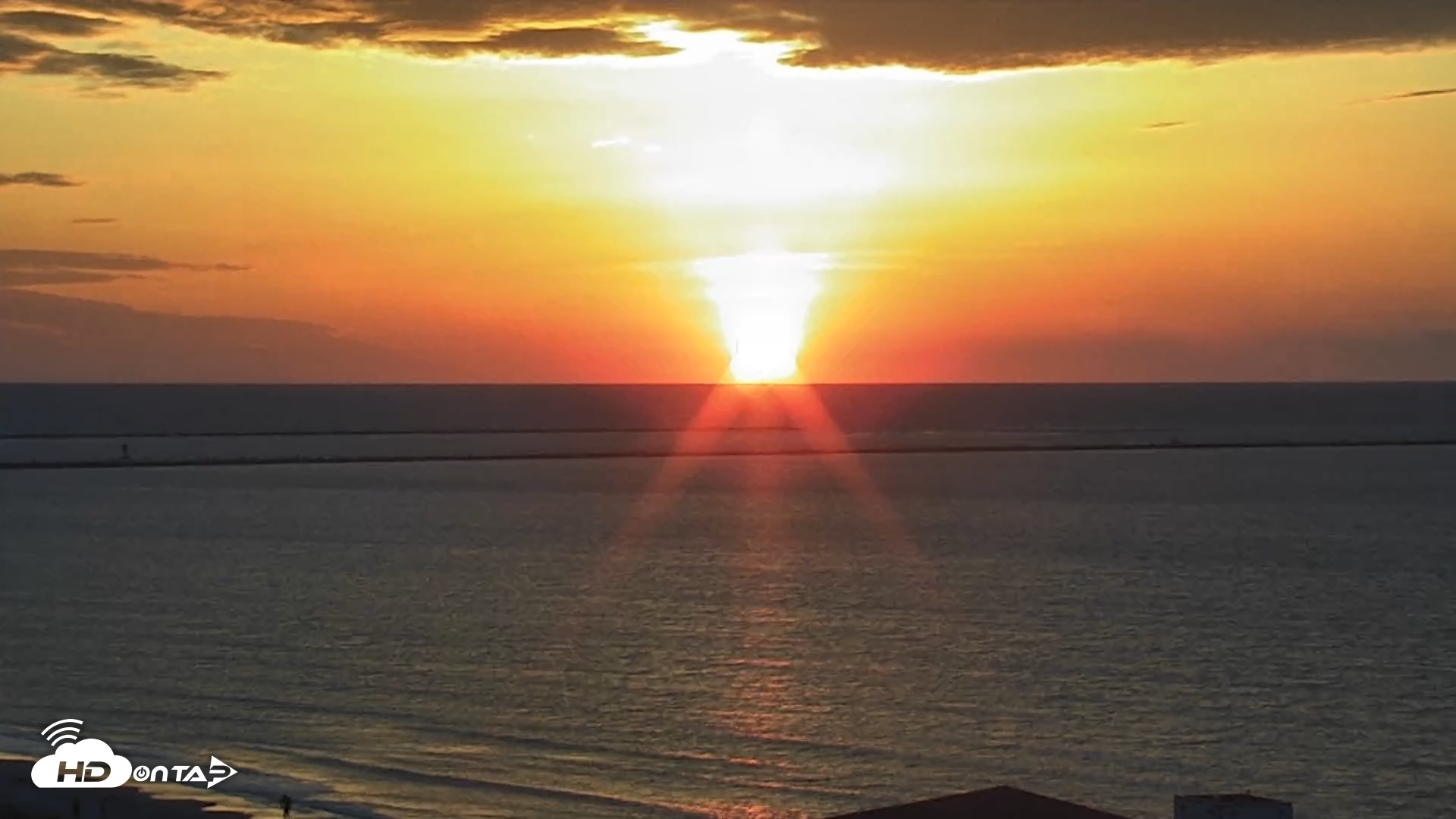 Snapshot of The Dunes - Port Aransas Live Beach Cam taken May 11, 2025, 6:44am CDT