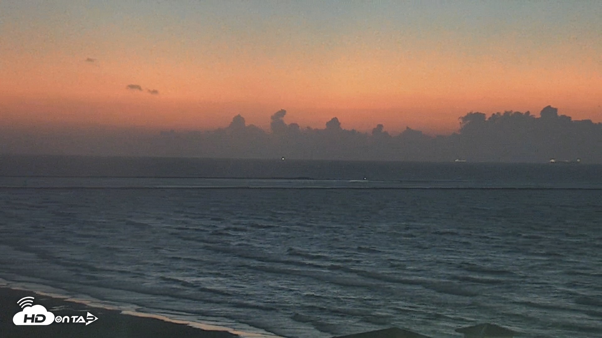 Snapshot of The Dunes - Port Aransas Live Beach Cam taken Aug 12, 2026, 6:27am CDT