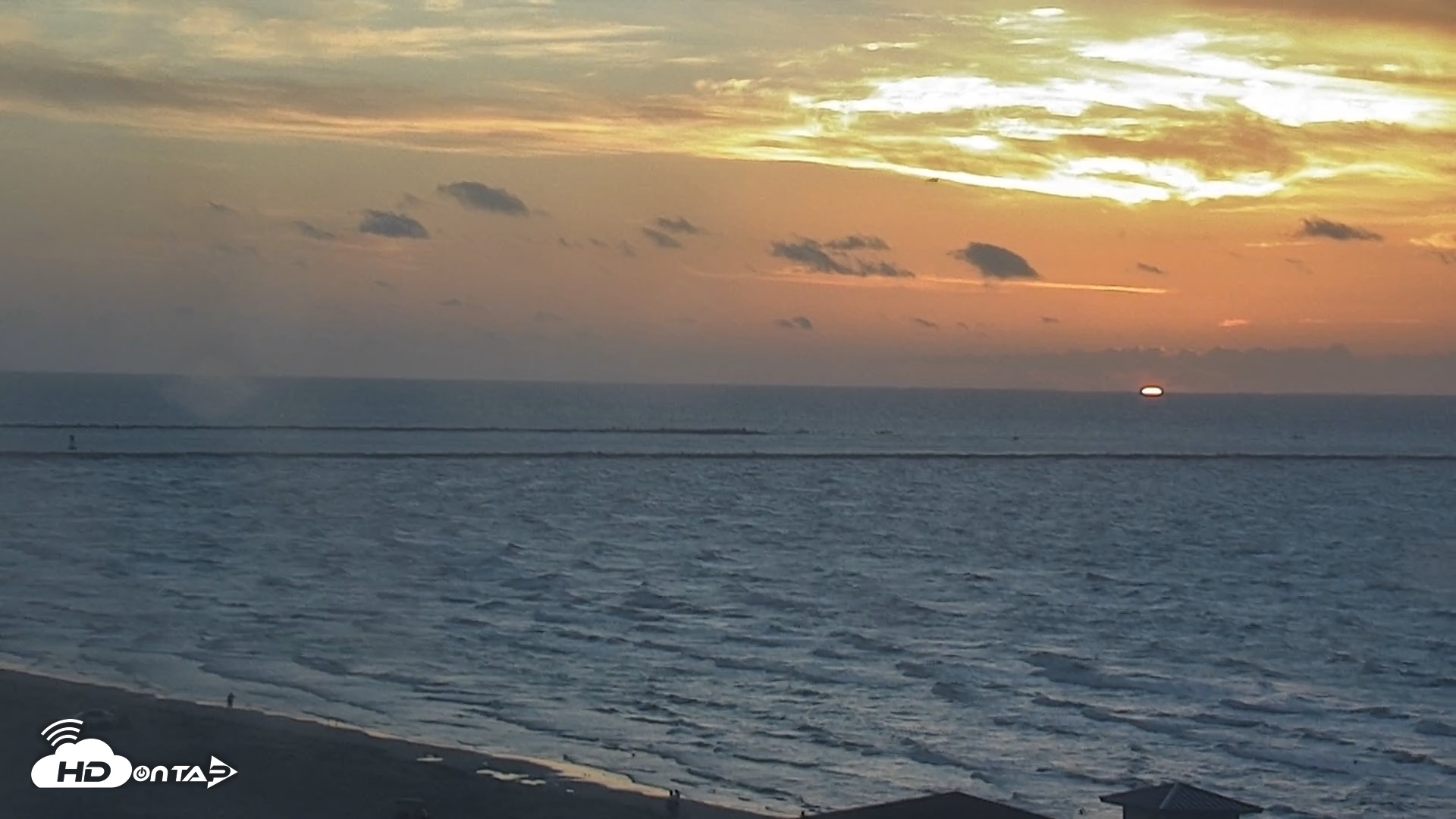 Snapshot of The Dunes - Port Aransas Live Beach Cam taken Aug 19, 2026, 7:03am CDT