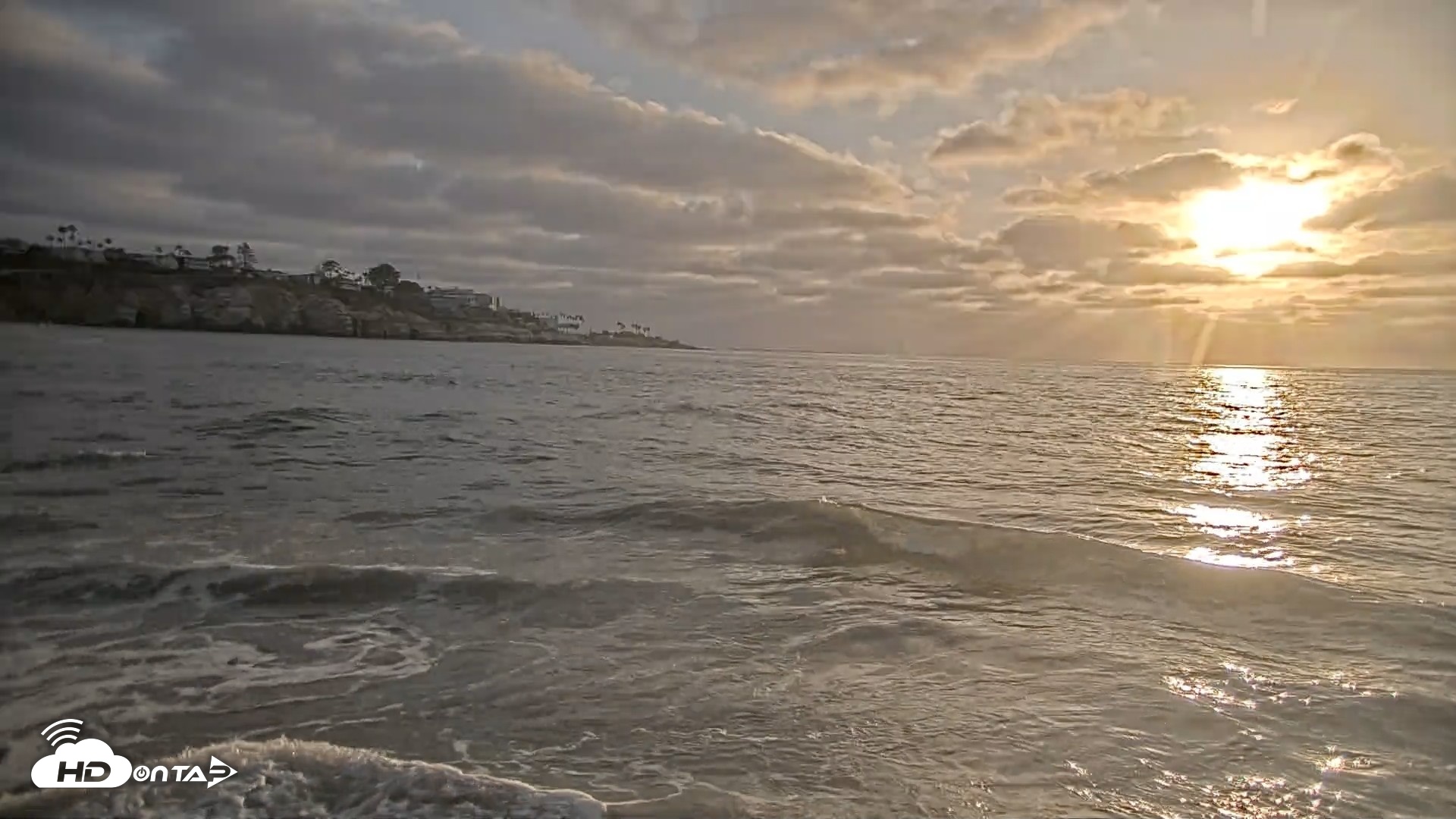 Snapshot of La Jolla Shores Live Surf Cam taken May 14, 2026, 7:04pm PDT