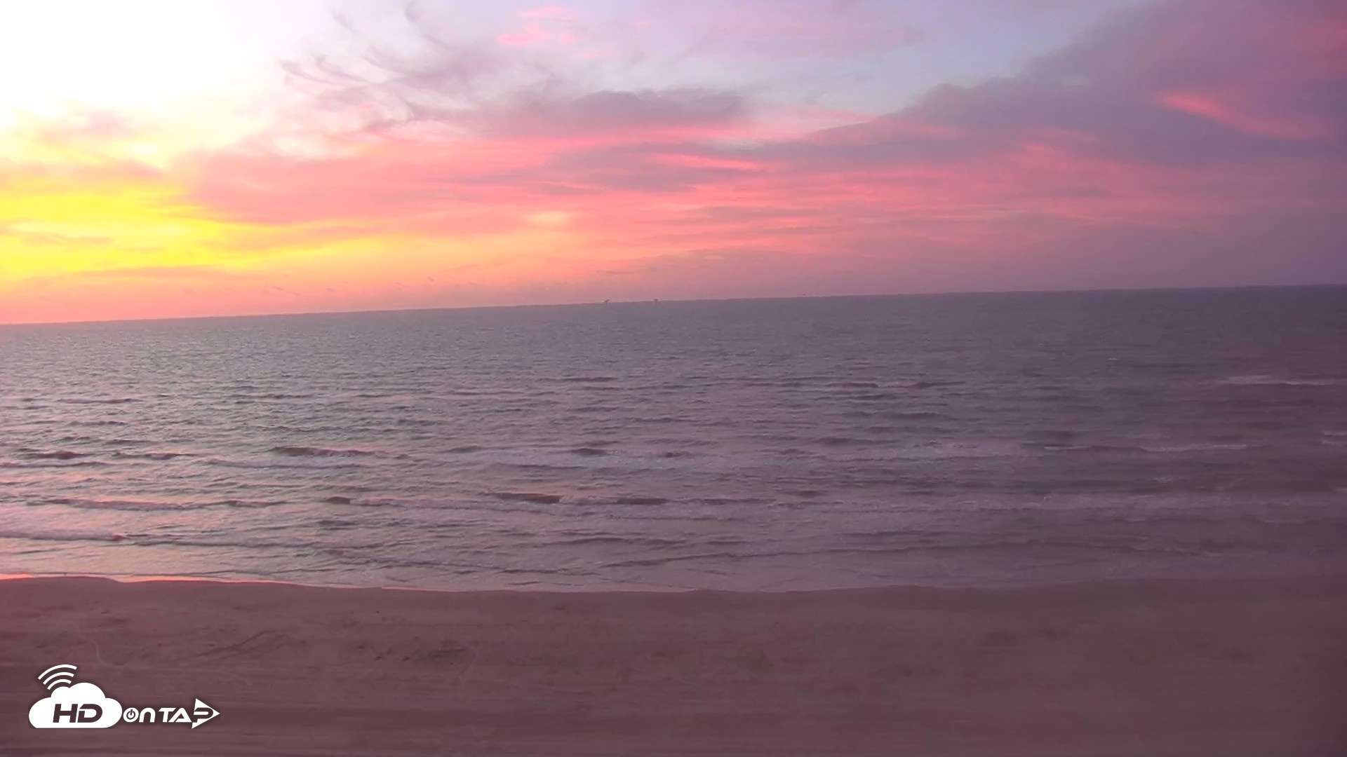 Snapshot of Gulf Shores - Port Aransas Live Beach Cam taken Aug 19, 2026, 6:51am CDT