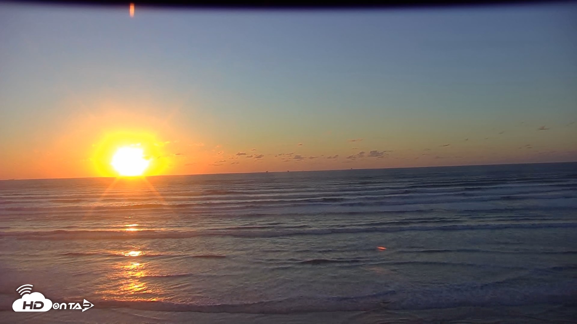 Snapshot of Gulf Shores - Port Aransas Live Beach Cam taken Oct 10, 2026, 7:35am CDT