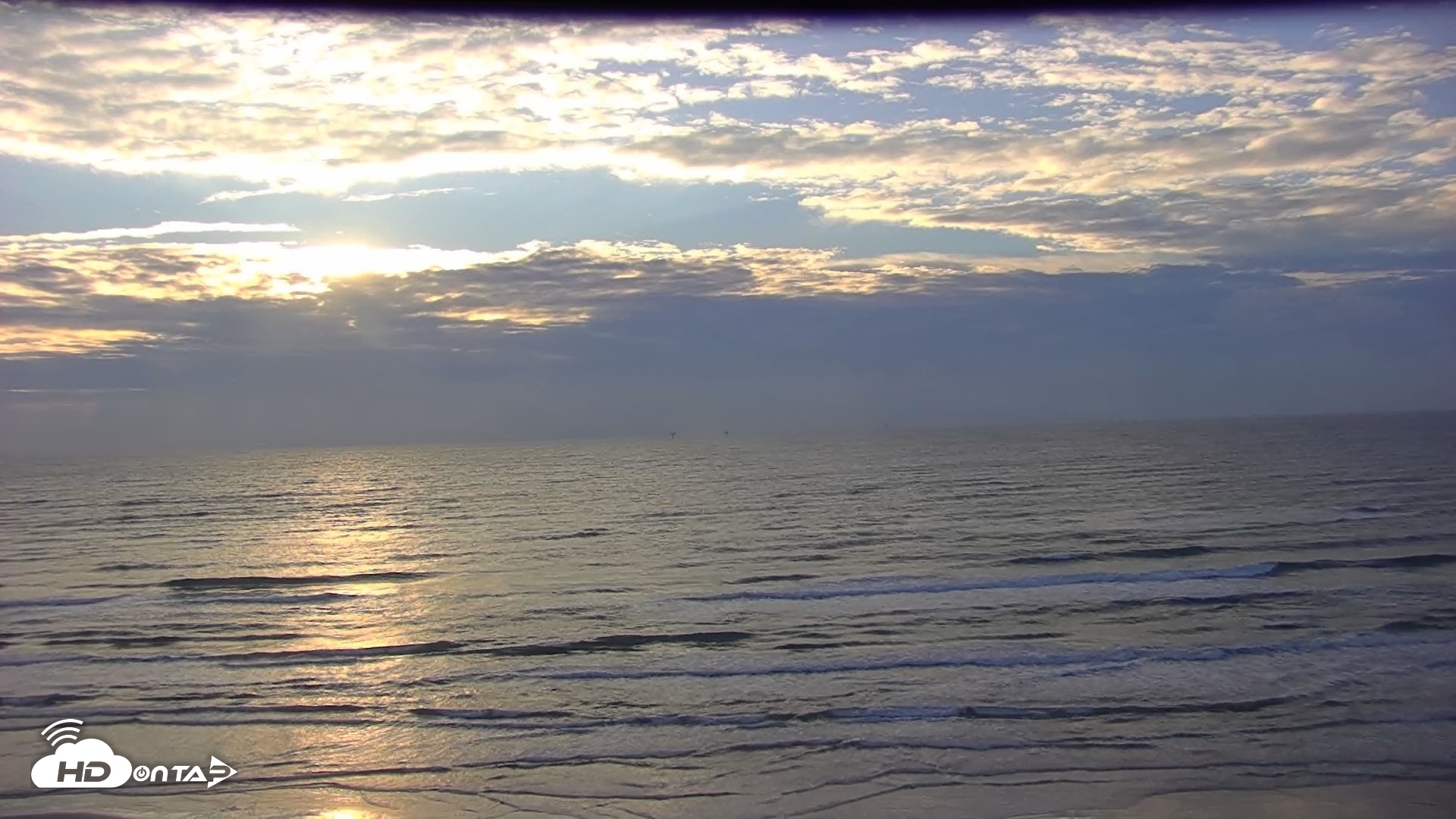 Snapshot of Gulf Shores - Port Aransas Live Beach Cam taken Oct 6, 2026, 7:57am CDT