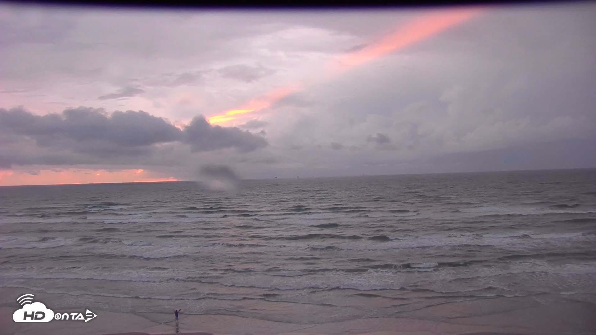 Snapshot of Gulf Shores - Port Aransas Live Beach Cam taken Oct 2, 2026, 7:25am CDT