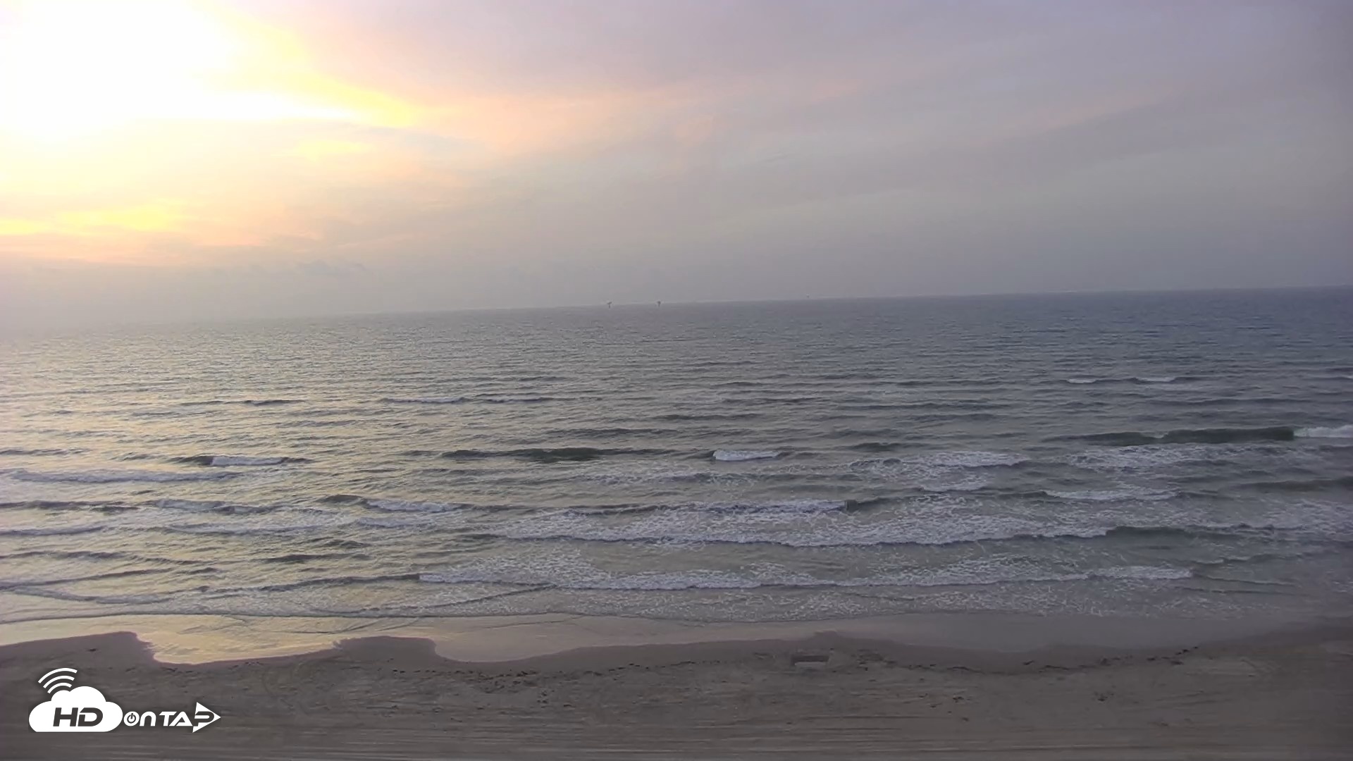 Snapshot of Gulf Shores - Port Aransas Live Beach Cam taken Jul 25, 2026, 6:47am CDT