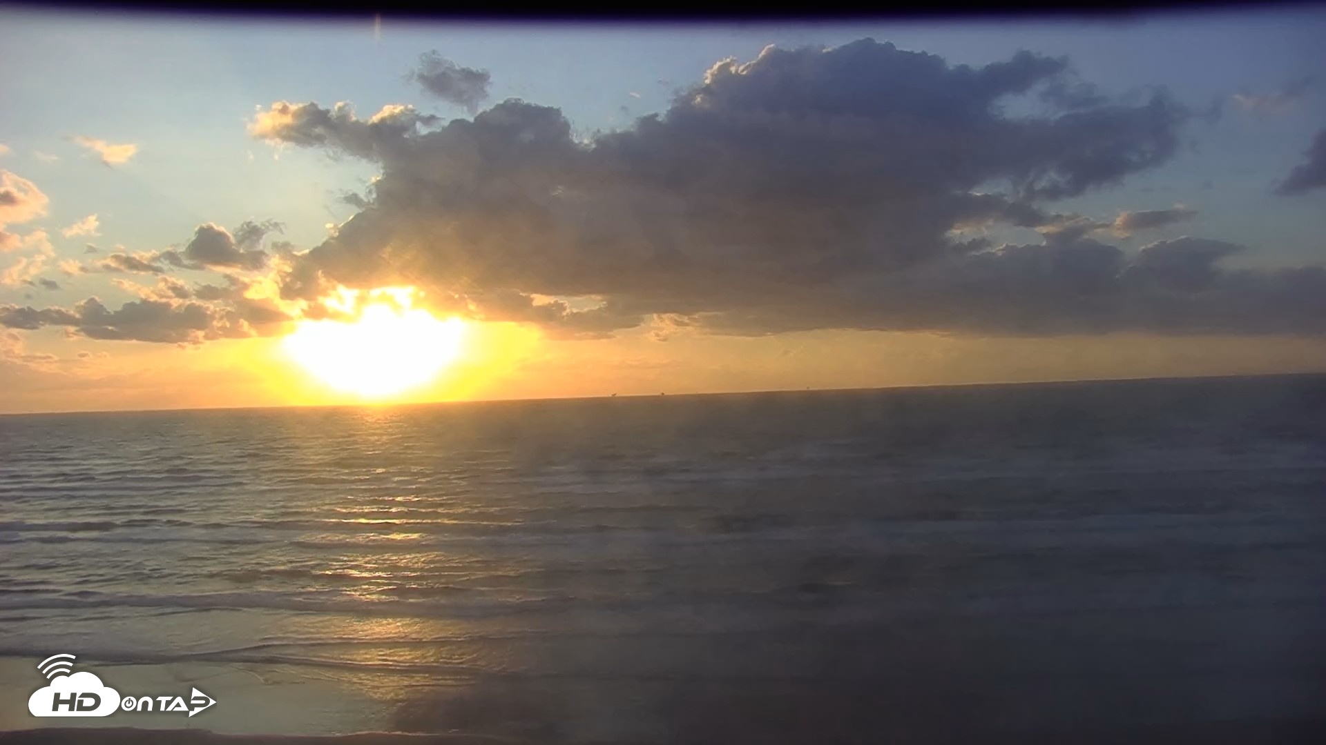 Snapshot of Gulf Shores - Port Aransas Live Beach Cam taken Oct 15, 2026, 7:50am CDT