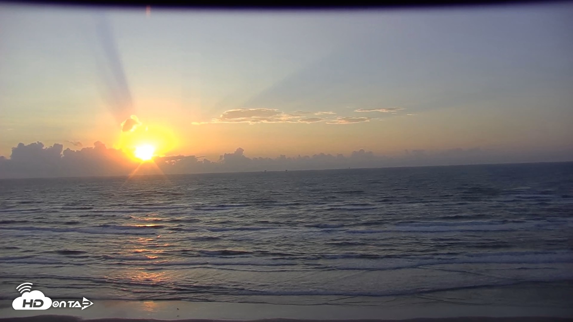 Snapshot of Gulf Shores - Port Aransas Live Beach Cam taken Oct 14, 2026, 7:39am CDT