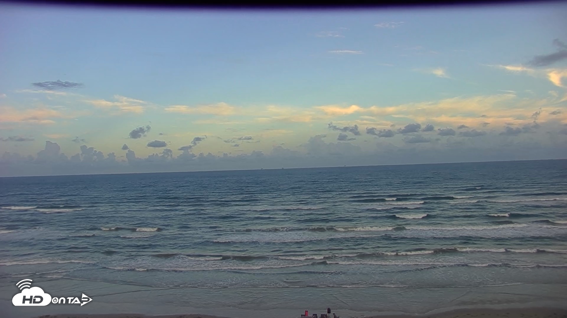 Snapshot of Gulf Shores - Port Aransas Live Beach Cam taken Oct 2, 2026, 6:59pm CDT