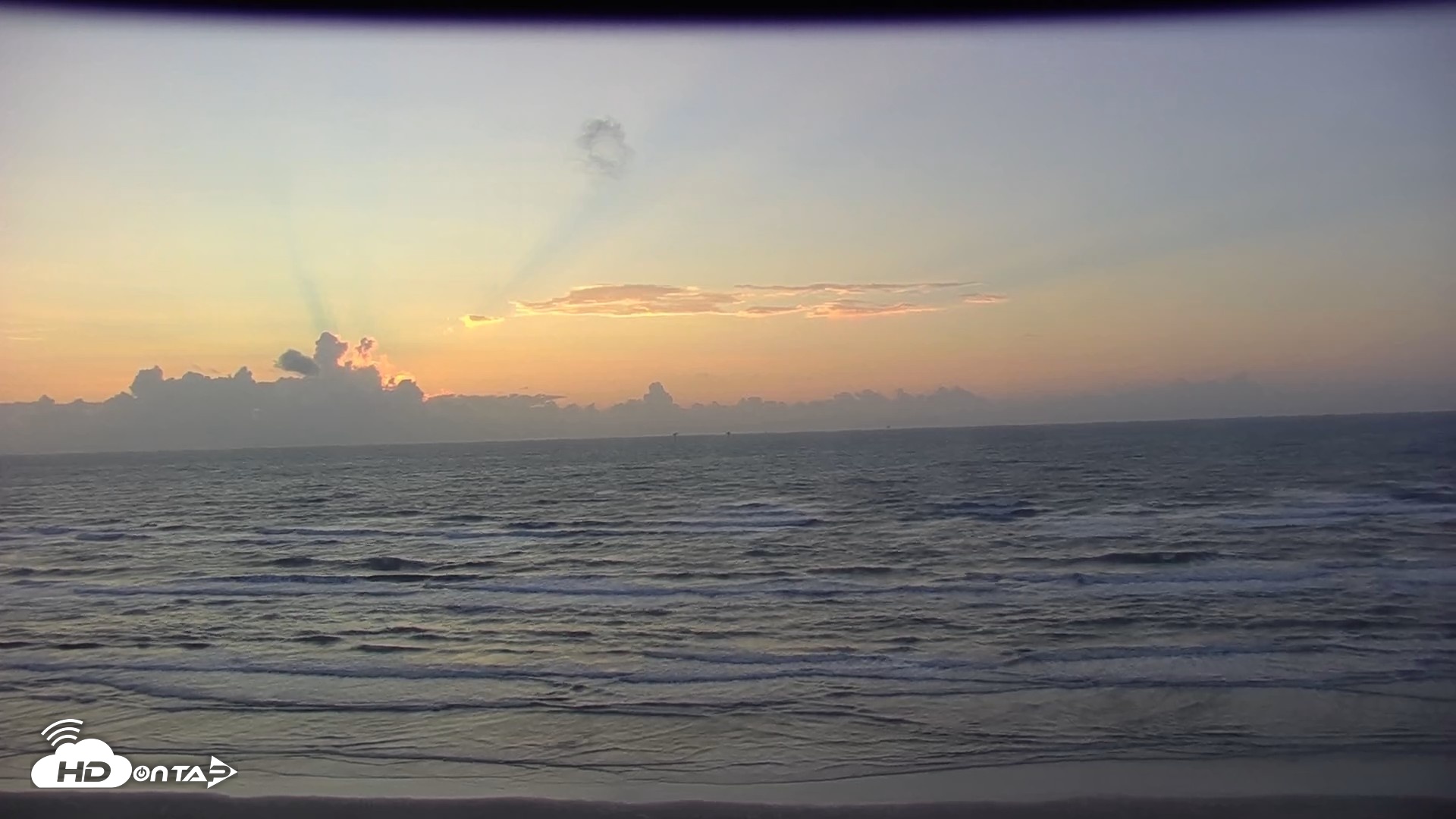 Snapshot of Gulf Shores - Port Aransas Live Beach Cam taken Oct 14, 2026, 7:34am CDT