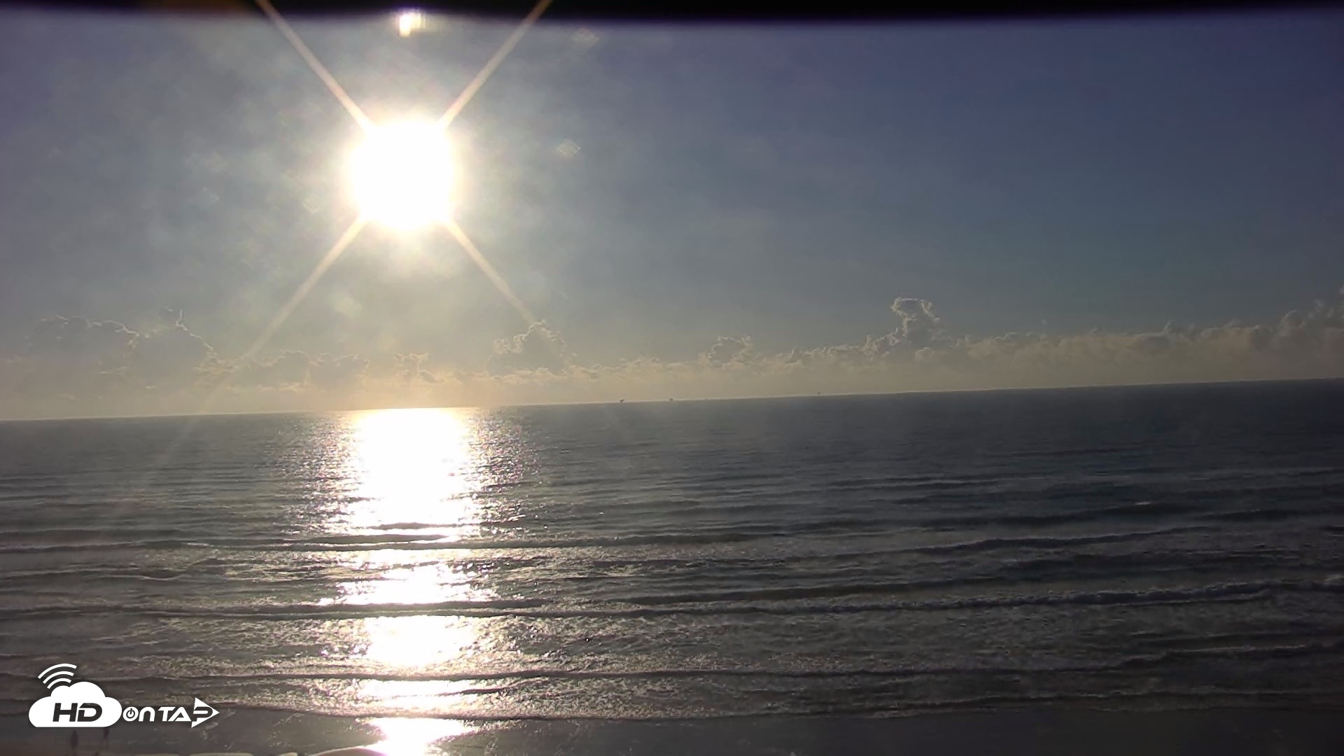 Snapshot of Gulf Shores - Port Aransas Live Beach Cam taken Oct 8, 2026, 8:22am CDT
