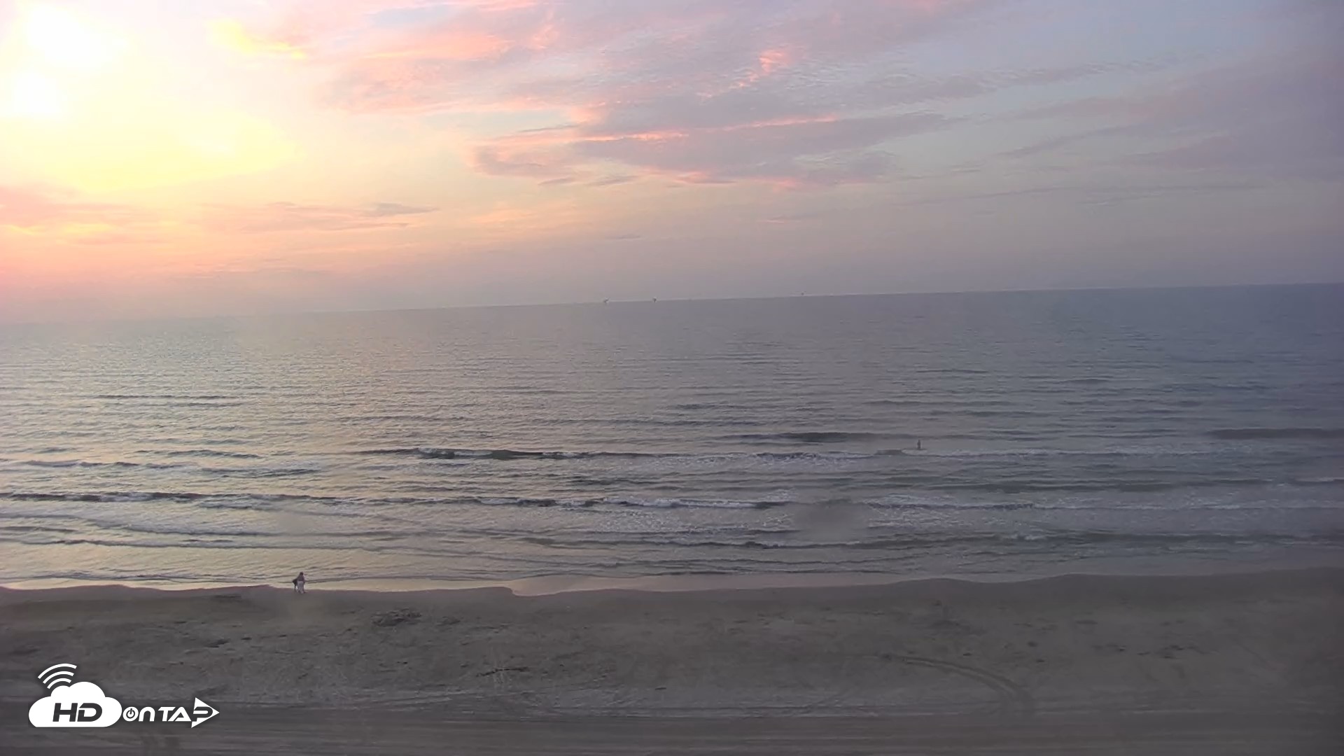 Snapshot of Gulf Shores - Port Aransas Live Beach Cam taken Aug 3, 2026, 6:52am CDT