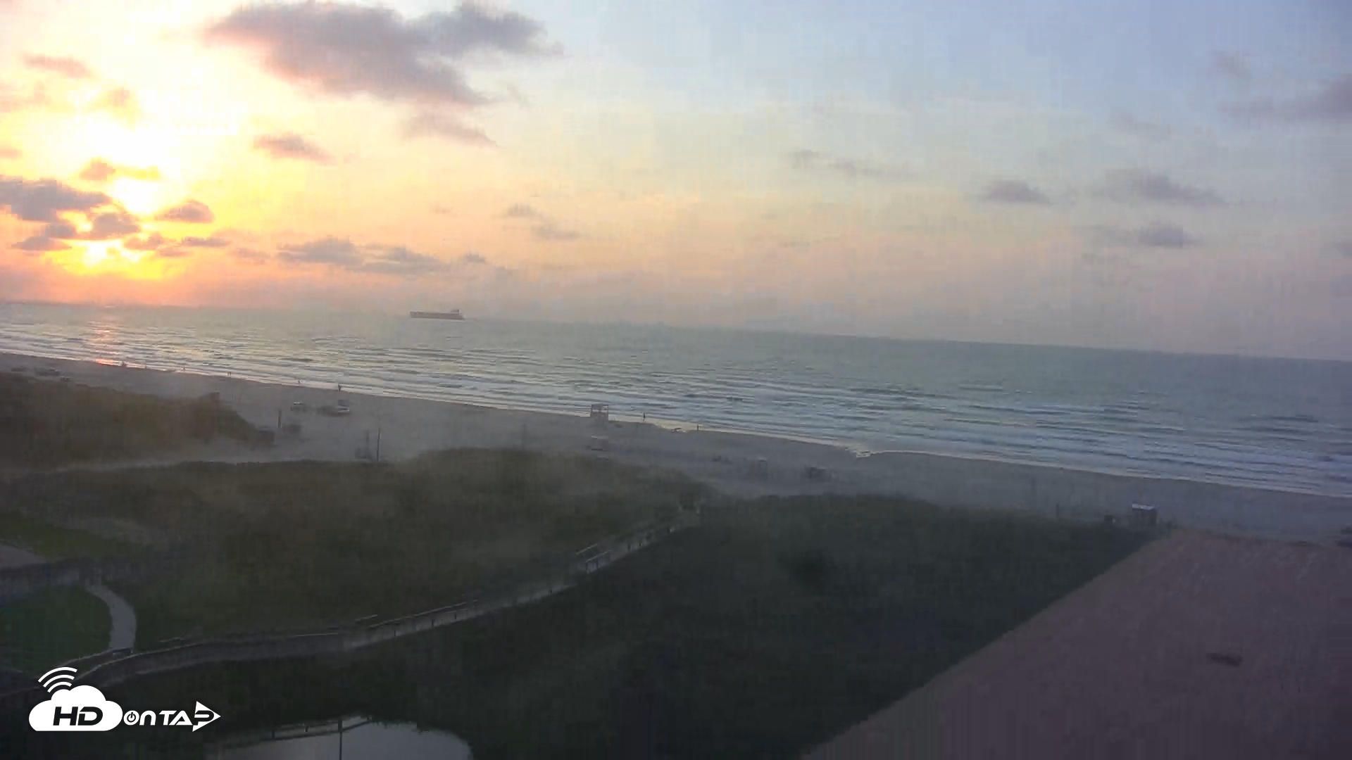 Snapshot of Sandcastle Condos Port Aransas Live Beach Cam taken May 29, 2025, 6:51am CDT