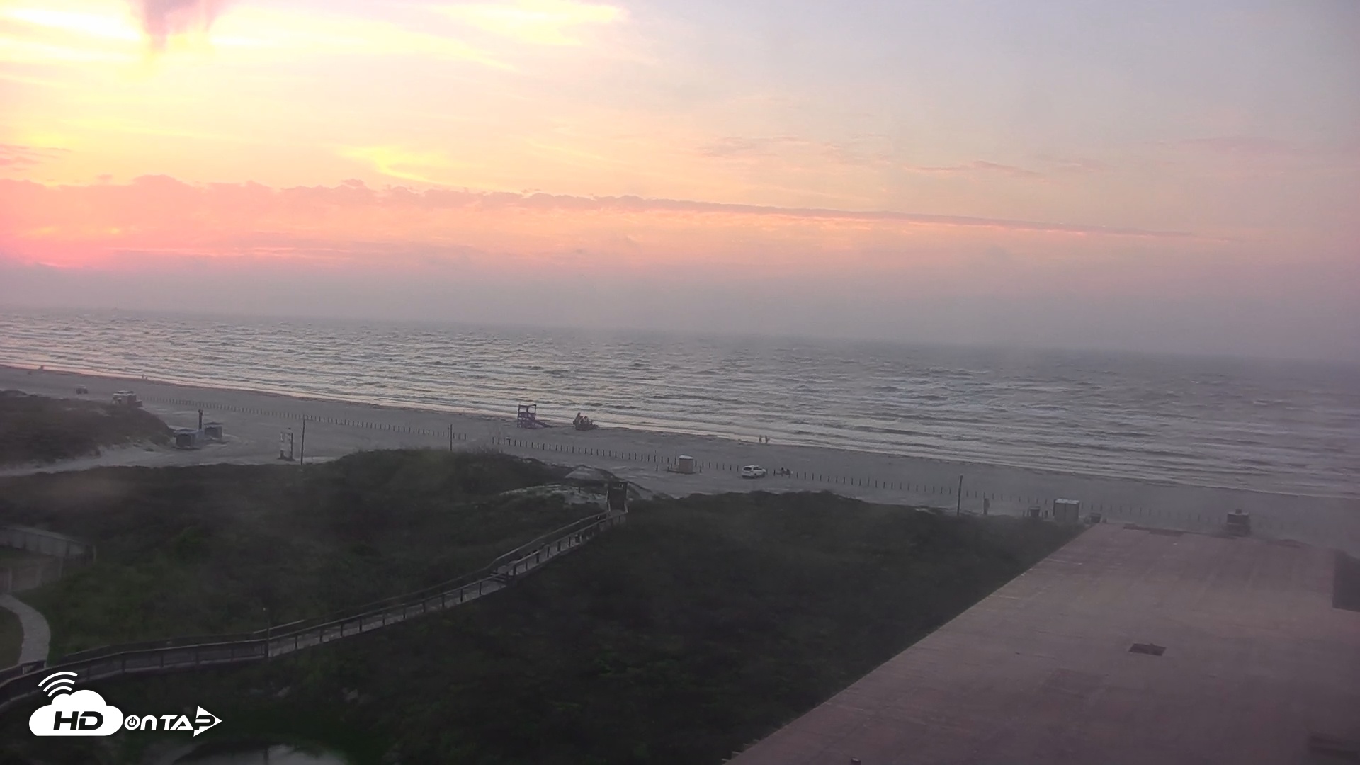 Snapshot of Sandcastle Condos Port Aransas Live Beach Cam taken May 15, 2025, 6:44am CDT