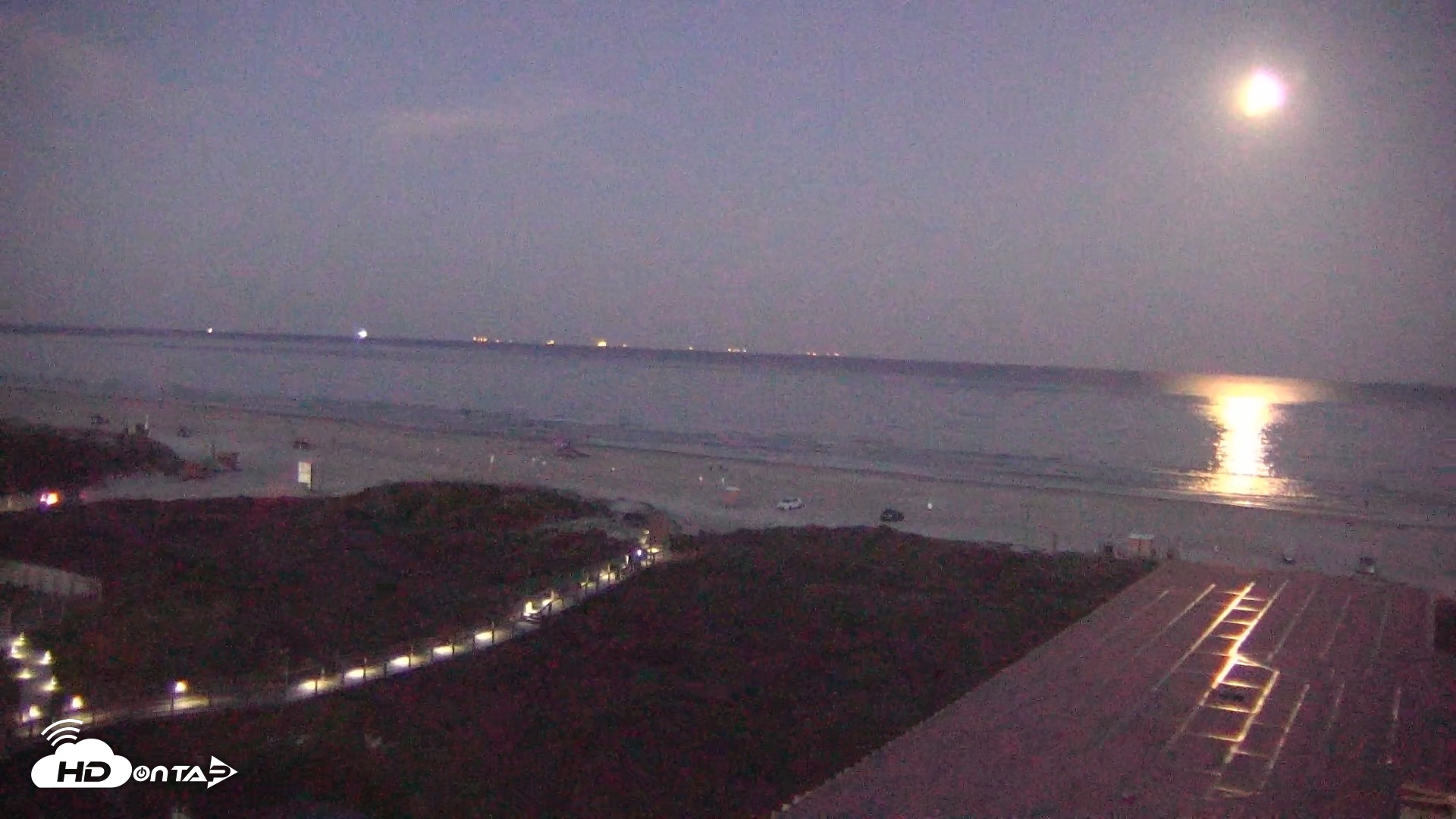 Snapshot of Sandcastle Condos Port Aransas Live Beach Cam taken May 11, 2025, 8:40pm CDT