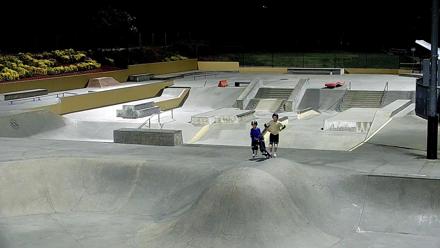 Skateboarders and BMX riders in motion across ramps, bowls, and plazas at Etnies Skate Park, Lake Forest, California
