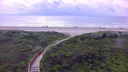 PTZ live webcam from Casa Condos showing Port Aransas Beach, rolling waves, and the Texas Gulf shoreline.