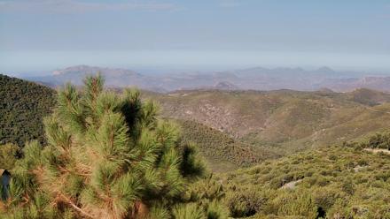 Mountain vista over ridgelines and sky from a fixed-cam atop Cuyamaca Mountain facing west