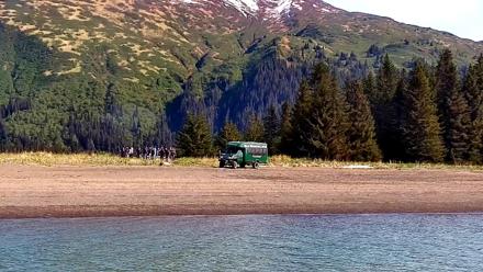 Live boat camera view from Anchor Point across Cook Inlet toward Lake Clark National Park's brown bear habitat.